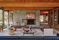 At The Luss House: Blum & Poe, Mendes Wood DM and Object & Thing. The Gerald Luss House, Ossining, New York. Photo by Michael Biondo. Works pictured [foreground left to right]: Gerald Luss, Sofa for The Gerald Luss House (c. 1950s); Frances Palmer, Terracotta Planter; two Not Yet Titled works by Alma Allen (2020) (2017); Gerald Luss, Coffee Table for The Gerald Luss House (c. 1950s), porcelain vases by Frances Palmer (2021); micaceous clay vessels by Johnny Ortiz (2021); Alma Allen bronze dish, Not Yet Titled (2019); Green River Project LLC, Aluminum and Leather Lounge Chair (2021); [background left to right]: Ritsue Mishima, Seed Crystal (2017), Fonte (2020), Arca (2012); Gerald Luss, Untitled (2020); two Untitled (2021) works by Yoichi Shiraishi; Cecily Brown, Reasons to be Cheerful (2020- 2021).