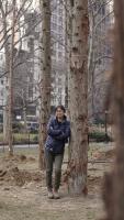 Maya Lin within Ghost Forest, 2021. Courtesy the artist and Madison Square Park Conservancy. Photo credit: Andy Romer