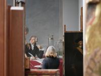 Conservator Dorothy Mahon working on Jacques Louis David's Portrait of Antoine-Laurent and Marie Anne Lavoisier at The Met Museum, New York. Credit: Eddie Knox © Oxford Films, 2021. Image courtesy PBS.