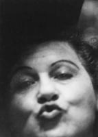 Diane Arbus, <em>Woman making a kissy face, Sammy's Bowery Follies, N.Y.C.</em>, 1958. Gelatin silver print. © The Estate of Diane Arbus