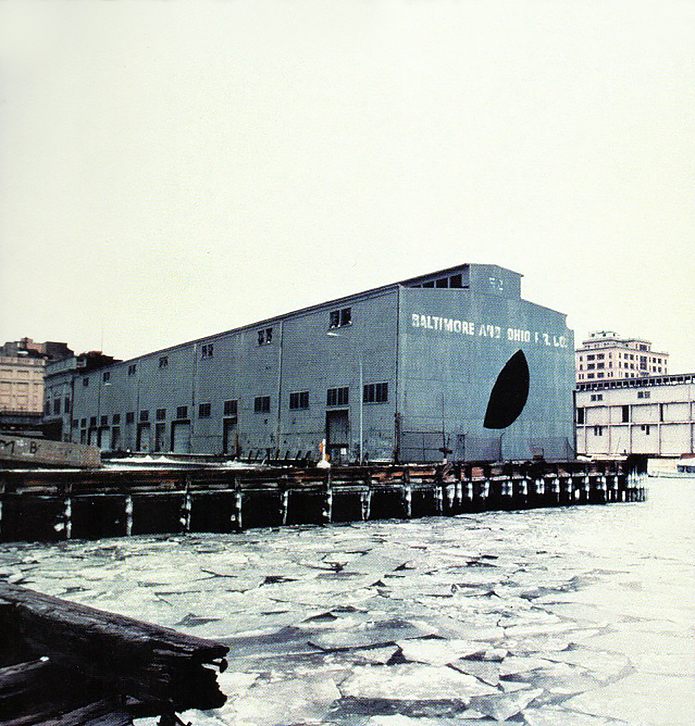 Gordon Matta-Clark, (1943-1978). Day's End (Pier 52) (Exterior with Ice), 1975. Color photograph, 1029 x 794 mm.  © Estate of Gordon Matta-Clark, Artists Rights Society (ARS), N.Y.
