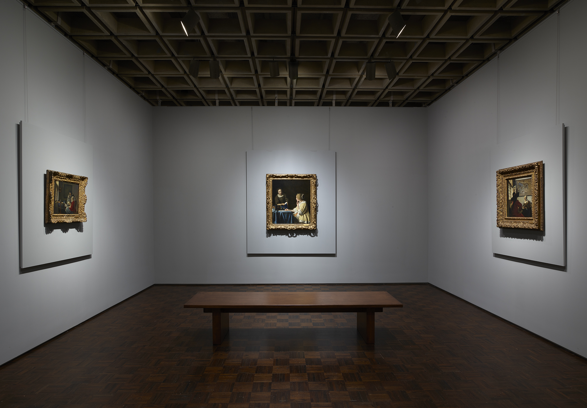 Three paintings by Vermeer (from left, Girl Interrupted at Her Music, Mistress and Maid, and Officer and Laughing Girl) as shown at Frick Madison by The Frick Collection; photo: Joe Coscia