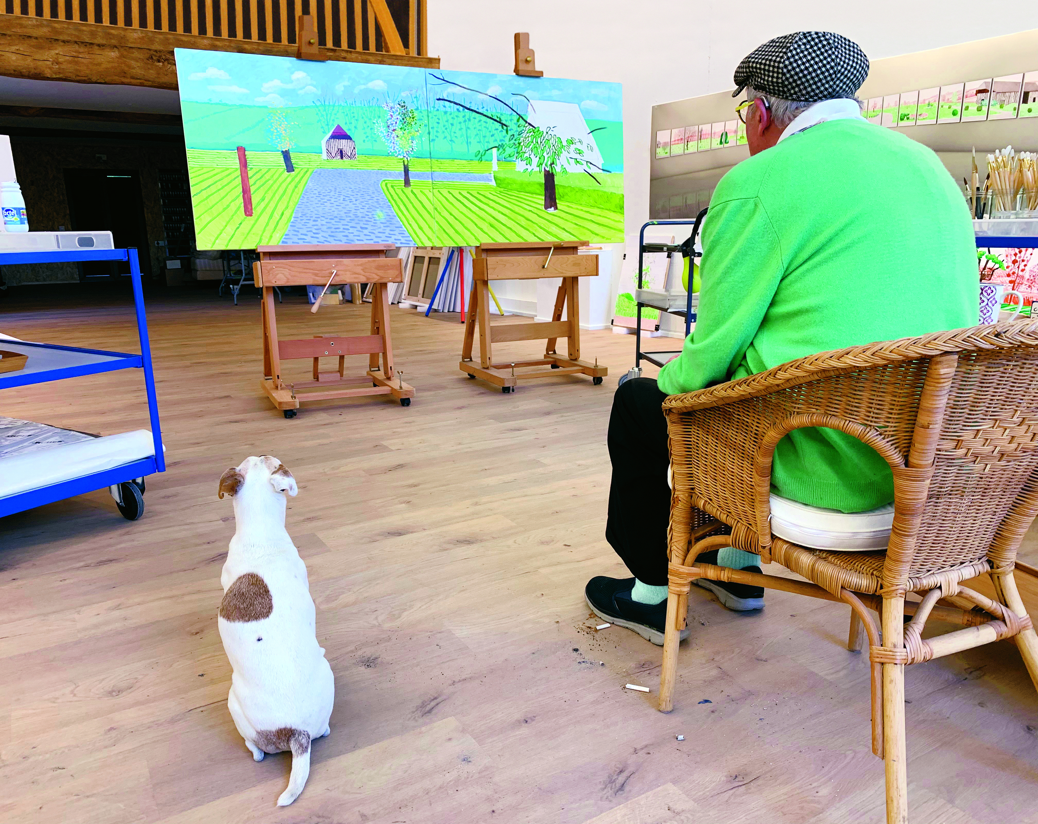 Page 34: David & Ruby in the Normandy studio, May 25th 2020 © David Hockney Photo Credit: Jean-Pierre Gonçalves de Lima