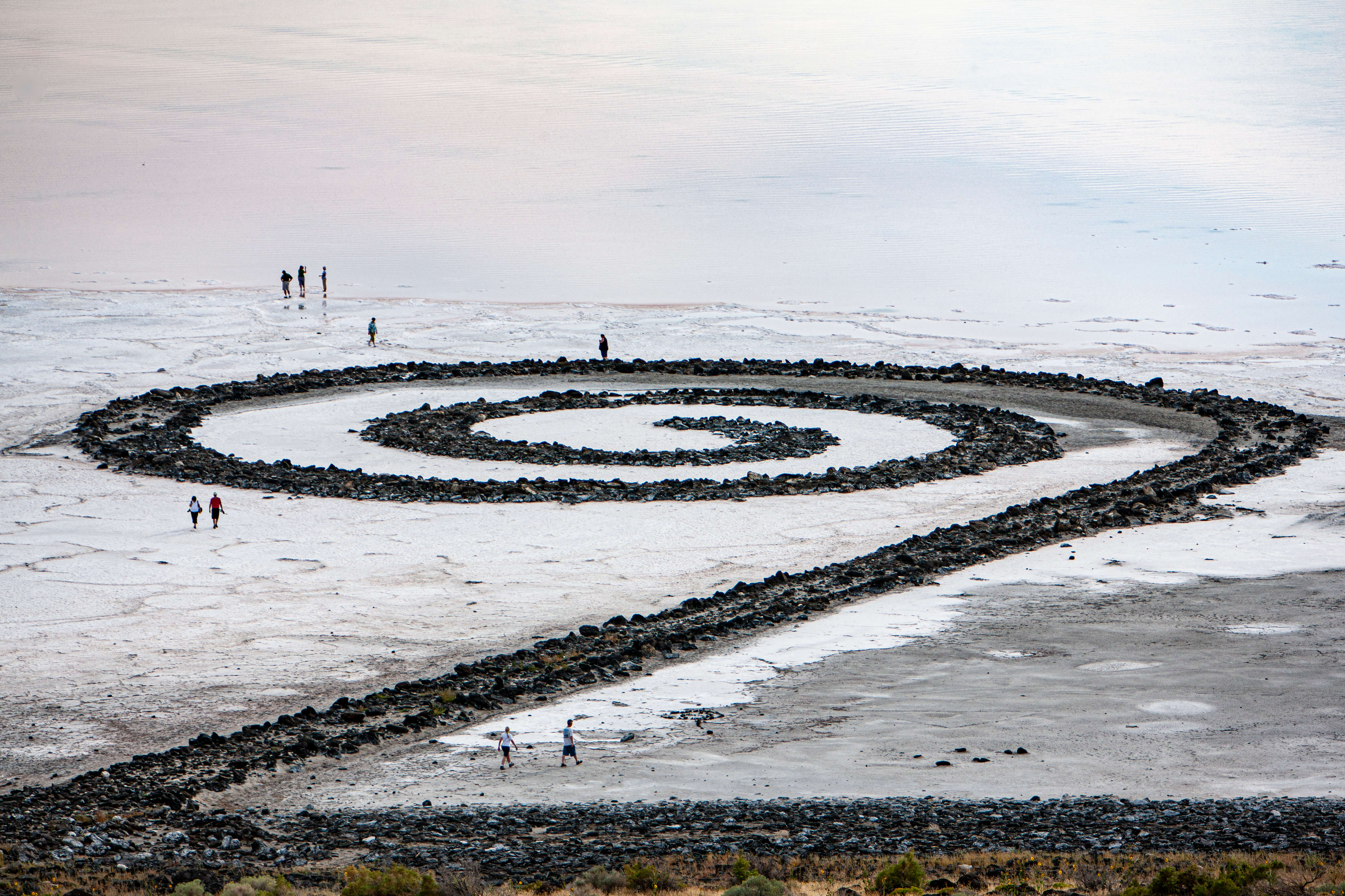 Gianfranco Gorgoni, _Robert Smithson’s Spiral Jetty, Rozel Point, Great Salt Lake, Utah, 1970_, 2013. Chromogenic print. Photograph from the Collection of the Nevada Museum of Art, The Altered Landscape, Carol Franc Buck Collection, with additional support from the Estate of Nancy L. Peppin; Photograph © Estate of Gianfranco Gorgoni; Artwork from the Collection of Dia Art Foundation; Artwork © Holt/Smithson Foundation and Dia Art Foundation / VAGA at Artists Rights Society (ARS), NY.