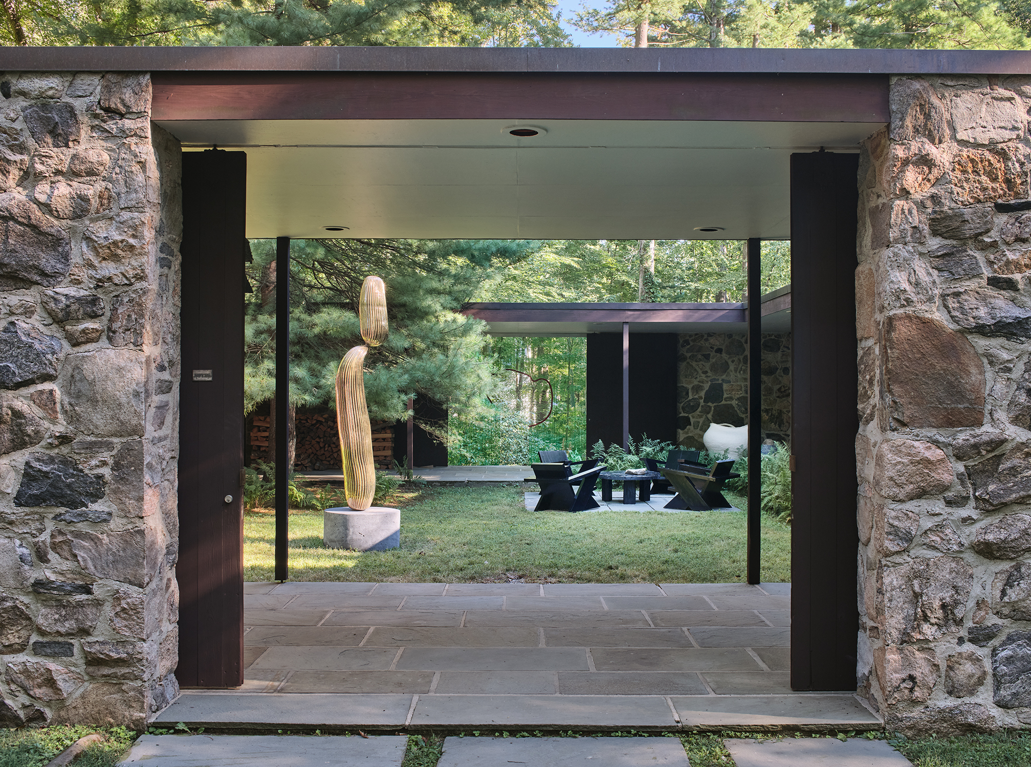 At The Noyes House: Blum & Poe, Mendes Wood DM and Object & Thing. The Noyes House, New Canaan, Connecticut. Photo by Michael Biondo. Works pictured [left to right]: Alma Allen, Not Yet Titled (2020); Daniel Steegmann Mangrané, Untitled (2020); Green River Project LLC, Pine Outdoor Coffee Table and Pine-Board Deck Chairs (2020); Kazunori Hamana, Untitled (2019).                  