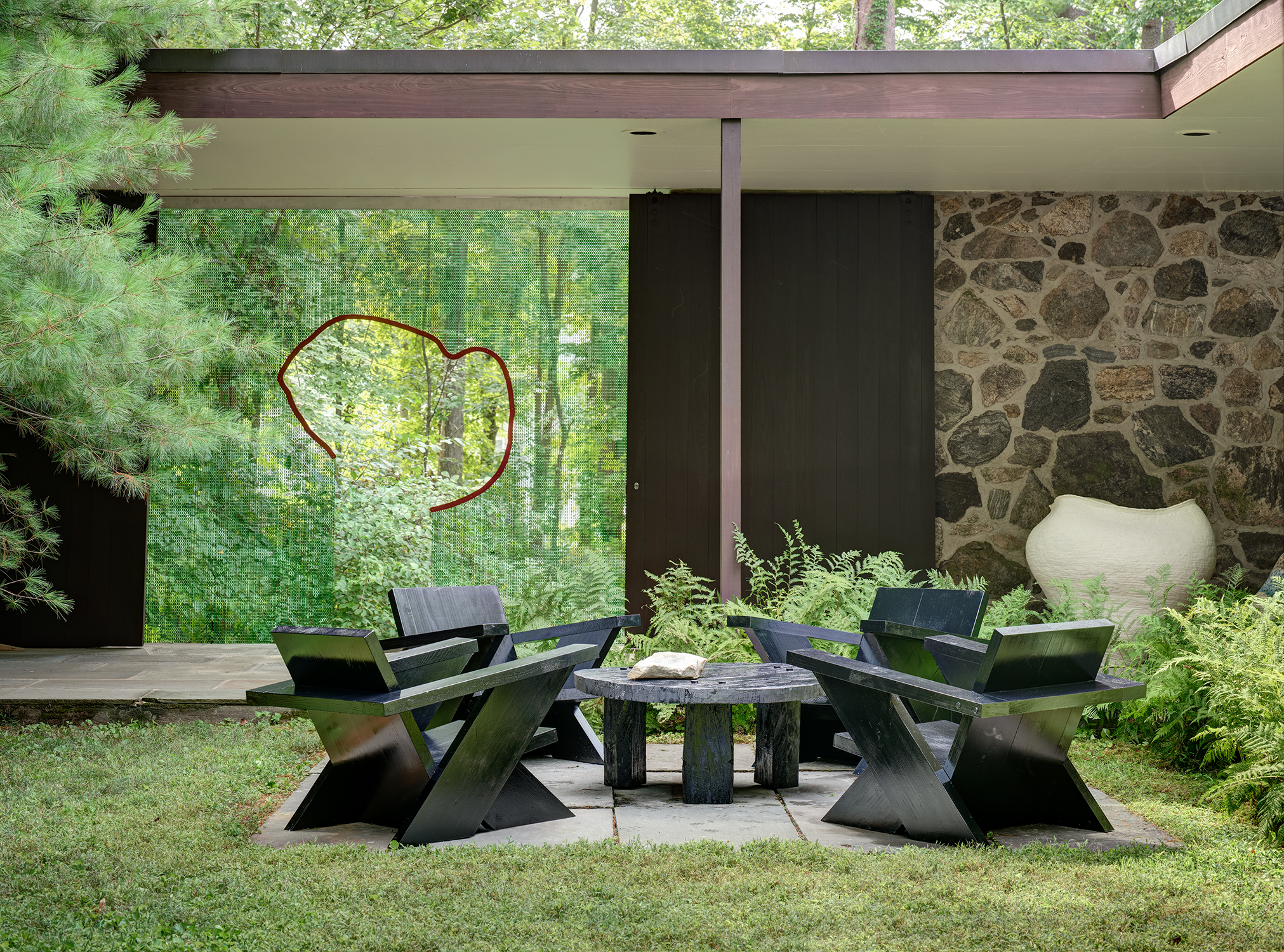 At The Noyes House: Blum & Poe, Mendes Wood DM and Object & Thing. The Noyes House, New Canaan, Connecticut. Photo by Michael Biondo. Works pictured [left to right]: Daniel Steegmann Mangrané, Untitled (2020); Green River Project LLC, Pine Outdoor Coffee Table, Pine-Board Deck Chairs, and Stone Vessel (2020); Kazunori Hamana, Untitled (2019).